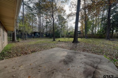 This lovely single-story home combines comfort, style, and on Hide-A-Way Lake Golf Course in Texas - for sale on GolfHomes.com, golf home, golf lot