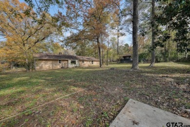 This lovely single-story home combines comfort, style, and on Hide-A-Way Lake Golf Course in Texas - for sale on GolfHomes.com, golf home, golf lot