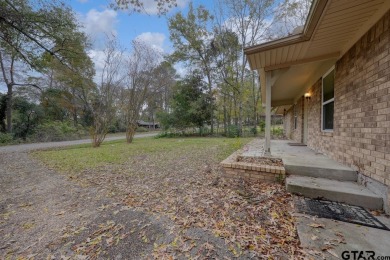 This lovely single-story home combines comfort, style, and on Hide-A-Way Lake Golf Course in Texas - for sale on GolfHomes.com, golf home, golf lot