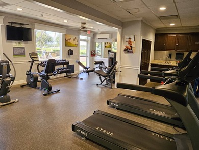 This spacious 3 bdrm,2 bath PALM HARBOR is completely furnished on Southport Springs Golf Club in Florida - for sale on GolfHomes.com, golf home, golf lot