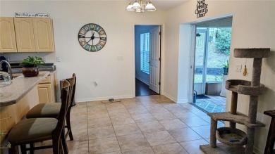 This inviting 3-bedroom, 2-bathroom home offers 1,648 square on Citrus Springs Country Club in Florida - for sale on GolfHomes.com, golf home, golf lot