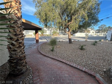 Discover this beautifully updated home in the legendary Paradise on Las Vegas National Golf Club in Nevada - for sale on GolfHomes.com, golf home, golf lot