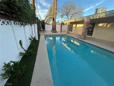 Discover this beautifully updated home in the legendary Paradise on Las Vegas National Golf Club in Nevada - for sale on GolfHomes.com, golf home, golf lot
