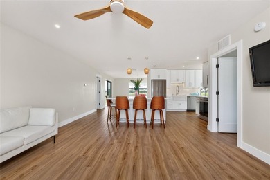 Modern Luxury Meets Beautiful Pond and Golf Course Views in This on Rotonda Golf and Country Club The Hills Course in Florida - for sale on GolfHomes.com, golf home, golf lot