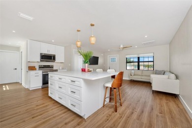 Modern Luxury Meets Beautiful Pond and Golf Course Views in This on Rotonda Golf and Country Club The Hills Course in Florida - for sale on GolfHomes.com, golf home, golf lot