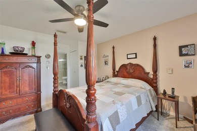 WELCOME TO THIS BEAUTIFULLY UPDATED TWINTREE residence on the on Caloosa Greens Executive Golf Course in Florida - for sale on GolfHomes.com, golf home, golf lot