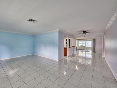 This is the largest 2/2/1 w/ the BONUS covered front porch on Leisureville Community Golf Course in Florida - for sale on GolfHomes.com, golf home, golf lot