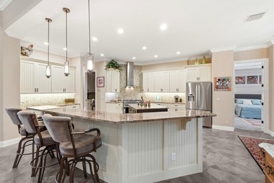 Experience luxury living in the gated Grand Haven community with on Grand Haven Golf Club in Florida - for sale on GolfHomes.com, golf home, golf lot