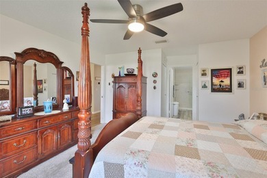 WELCOME TO THIS BEAUTIFULLY UPDATED TWINTREE residence on the on Caloosa Greens Executive Golf Course in Florida - for sale on GolfHomes.com, golf home, golf lot