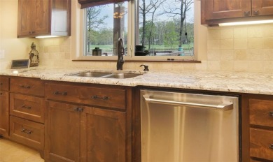 Nestled within the prestigious Links at Land's End community on on Links At Lands End in Texas - for sale on GolfHomes.com, golf home, golf lot