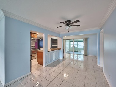 This is the largest 2/2/1 w/ the BONUS covered front porch on Leisureville Community Golf Course in Florida - for sale on GolfHomes.com, golf home, golf lot