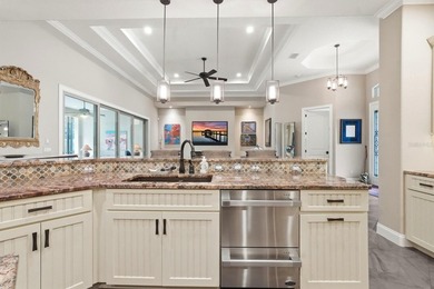 Experience luxury living in the gated Grand Haven community with on Grand Haven Golf Club in Florida - for sale on GolfHomes.com, golf home, golf lot