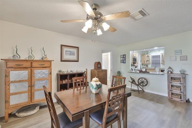 WELCOME TO THIS BEAUTIFULLY UPDATED TWINTREE residence on the on Caloosa Greens Executive Golf Course in Florida - for sale on GolfHomes.com, golf home, golf lot