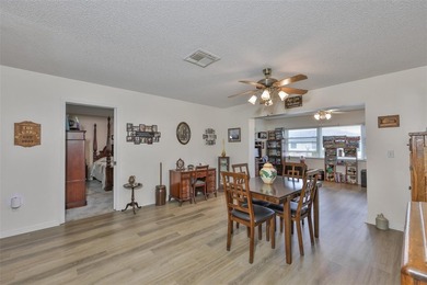 WELCOME TO THIS BEAUTIFULLY UPDATED TWINTREE residence on the on Caloosa Greens Executive Golf Course in Florida - for sale on GolfHomes.com, golf home, golf lot