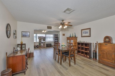 WELCOME TO THIS BEAUTIFULLY UPDATED TWINTREE residence on the on Caloosa Greens Executive Golf Course in Florida - for sale on GolfHomes.com, golf home, golf lot