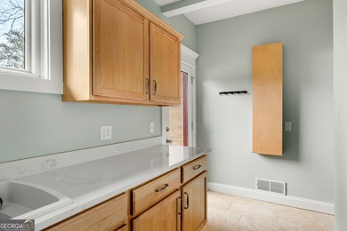 Move-in ready and completely renovated, this 3-bedroom, 2-bath on Chattahoochee Golf Course in Georgia - for sale on GolfHomes.com, golf home, golf lot