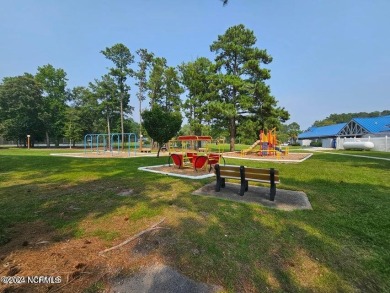 This home is to be built. 

Gorgeous one-story Ranch on on Harbour Point Golf Club in North Carolina - for sale on GolfHomes.com, golf home, golf lot