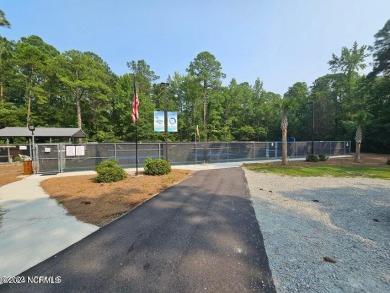 This home is to be built. 

Gorgeous one-story Ranch on on Harbour Point Golf Club in North Carolina - for sale on GolfHomes.com, golf home, golf lot