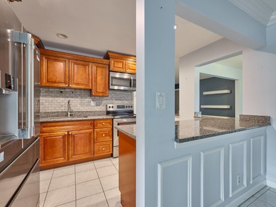 This is the largest 2/2/1 w/ the BONUS covered front porch on Leisureville Community Golf Course in Florida - for sale on GolfHomes.com, golf home, golf lot