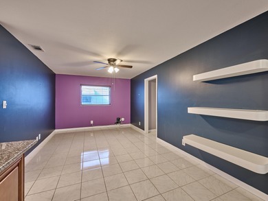 This is the largest 2/2/1 w/ the BONUS covered front porch on Leisureville Community Golf Course in Florida - for sale on GolfHomes.com, golf home, golf lot