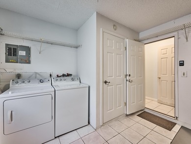 This is the largest 2/2/1 w/ the BONUS covered front porch on Leisureville Community Golf Course in Florida - for sale on GolfHomes.com, golf home, golf lot