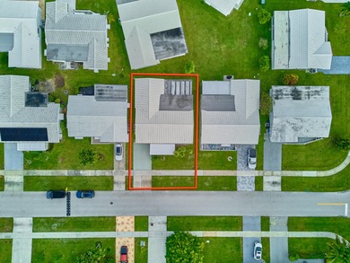 This is the largest 2/2/1 w/ the BONUS covered front porch on Leisureville Community Golf Course in Florida - for sale on GolfHomes.com, golf home, golf lot