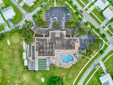 This is the largest 2/2/1 w/ the BONUS covered front porch on Leisureville Community Golf Course in Florida - for sale on GolfHomes.com, golf home, golf lot