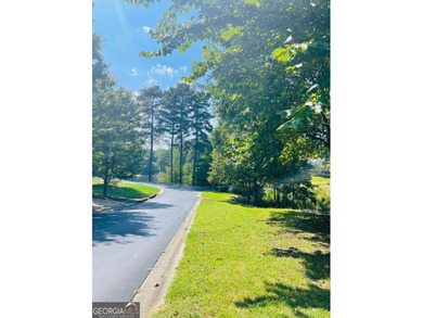 What a beautiful approach to your new lot.  Enjoy a quiet on Hawks Ridge Golf Club in Georgia - for sale on GolfHomes.com, golf home, golf lot