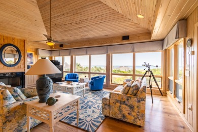 Perched atop the high dunes, a classical beach home is a reverse on Bald Head Island Golf Club in North Carolina - for sale on GolfHomes.com, golf home, golf lot