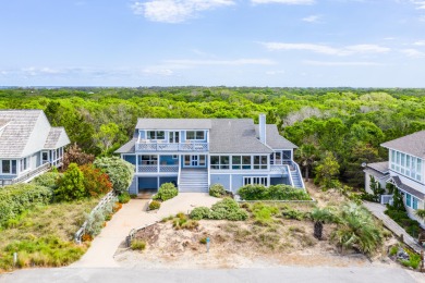 Perched atop the high dunes, a classical beach home is a reverse on Bald Head Island Golf Club in North Carolina - for sale on GolfHomes.com, golf home, golf lot