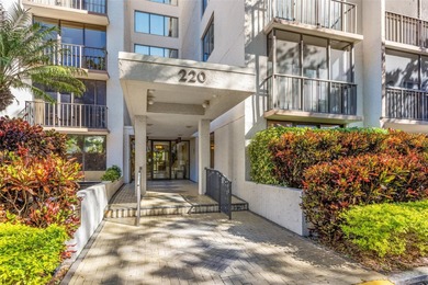 Enjoy convenience, privacy, and security in this light-filled on Belleair Country Club in Florida - for sale on GolfHomes.com, golf home, golf lot