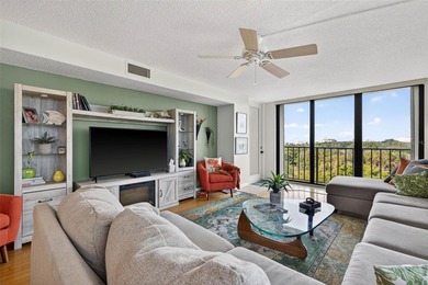 Enjoy convenience, privacy, and security in this light-filled on Belleair Country Club in Florida - for sale on GolfHomes.com, golf home, golf lot