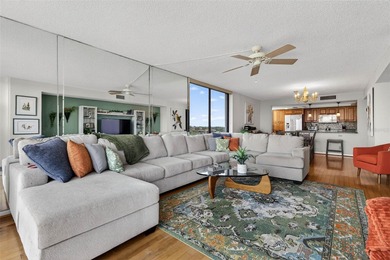 Enjoy convenience, privacy, and security in this light-filled on Belleair Country Club in Florida - for sale on GolfHomes.com, golf home, golf lot