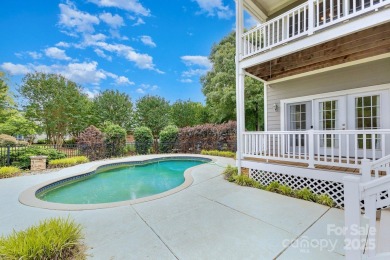 Enjoy beautiful water views of Lake Norman from this charming on Mallard Head Country Club in North Carolina - for sale on GolfHomes.com, golf home, golf lot