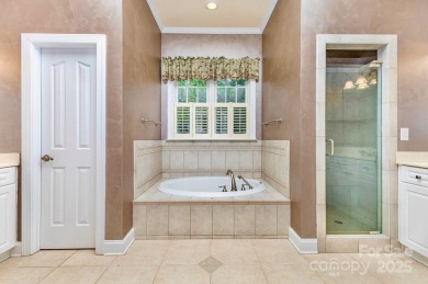 Enjoy beautiful water views of Lake Norman from this charming on Mallard Head Country Club in North Carolina - for sale on GolfHomes.com, golf home, golf lot