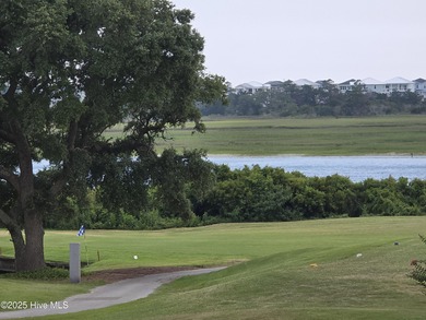 live waterfront at an affordable price. Waterfront views of on Brick Landing Plantation Yacht and Golf Club in North Carolina - for sale on GolfHomes.com, golf home, golf lot