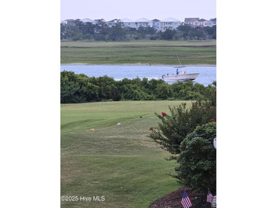 live waterfront at an affordable price. Waterfront views of on Brick Landing Plantation Yacht and Golf Club in North Carolina - for sale on GolfHomes.com, golf home, golf lot