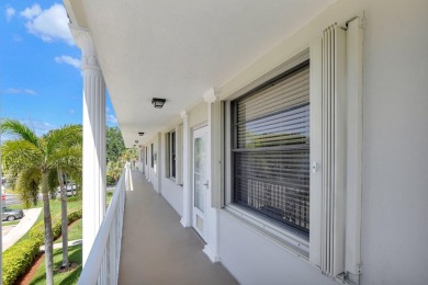 This well maintained and spacious condo comes with real bamboo on The Country Club At Boca Raton in Florida - for sale on GolfHomes.com, golf home, golf lot