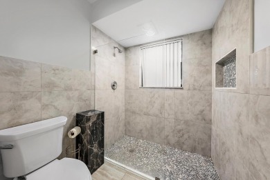 This one-of-a-kind, fully furnished 2BD/2BA villa in the on Old Marsh Golf Club in Florida - for sale on GolfHomes.com, golf home, golf lot