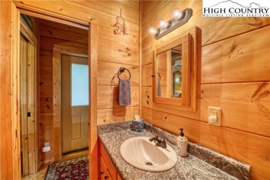 Adorable one bedroom, one bath Green River Cabin in the resort on Land Harbor Golf Course in North Carolina - for sale on GolfHomes.com, golf home, golf lot