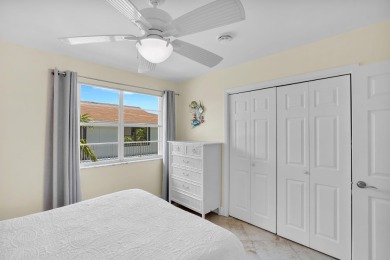 This well-maintained 2 Bedroom, 2 Bath elevated canal front half on Key Colony Beach Golf Course in Florida - for sale on GolfHomes.com, golf home, golf lot