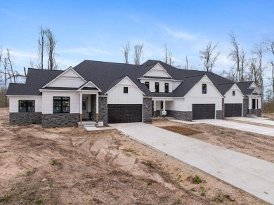 Experience elevated living at 809 Fairways Drive, located in The on Birchwood Farms Golf and Country Club in Michigan - for sale on GolfHomes.com, golf home, golf lot