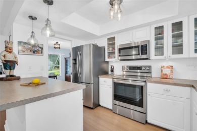 Welcome to this beautifully maintained 2-bedroom, 2-bathroom on Highland Lakes Executive Golf Course in Florida - for sale on GolfHomes.com, golf home, golf lot