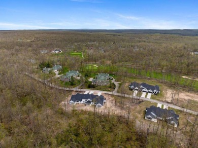 Experience elevated living at 809 Fairways Drive, located in The on Birchwood Farms Golf and Country Club in Michigan - for sale on GolfHomes.com, golf home, golf lot