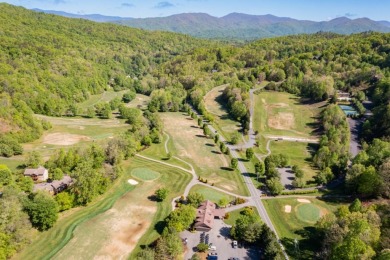 Discover the luxury of waterfront living in Western North on Smoky Mountain Country Club in North Carolina - for sale on GolfHomes.com, golf home, golf lot