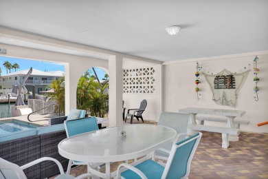 This well-maintained 2 Bedroom, 2 Bath elevated canal front half on Key Colony Beach Golf Course in Florida - for sale on GolfHomes.com, golf home, golf lot