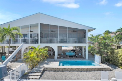 This well-maintained 2 Bedroom, 2 Bath elevated canal front half on Key Colony Beach Golf Course in Florida - for sale on GolfHomes.com, golf home, golf lot