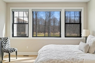 Experience elevated living at 809 Fairways Drive, located in The on Birchwood Farms Golf and Country Club in Michigan - for sale on GolfHomes.com, golf home, golf lot