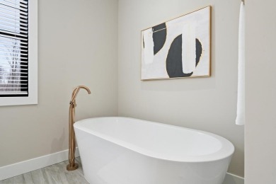 Experience elevated living at 809 Fairways Drive, located in The on Birchwood Farms Golf and Country Club in Michigan - for sale on GolfHomes.com, golf home, golf lot