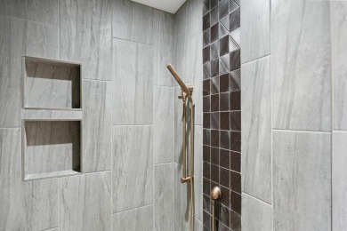 Experience elevated living at 809 Fairways Drive, located in The on Birchwood Farms Golf and Country Club in Michigan - for sale on GolfHomes.com, golf home, golf lot